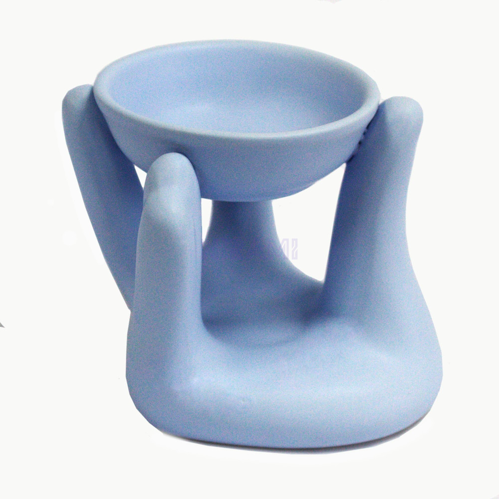 Quemador de aceite - mano azul